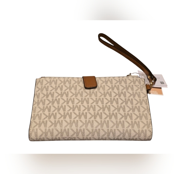 Michael Kors Handbags - Michael Kors Jet Set Travel Large Double Zip Wristlet NWT Cream & Tan